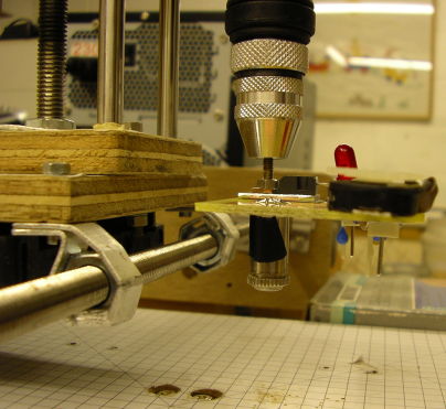 Laser stenciller mounted
                    in drill chuck